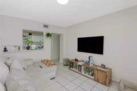Living - 334 E 11th St, Hialeah, FL 33010 photo 5 of 7