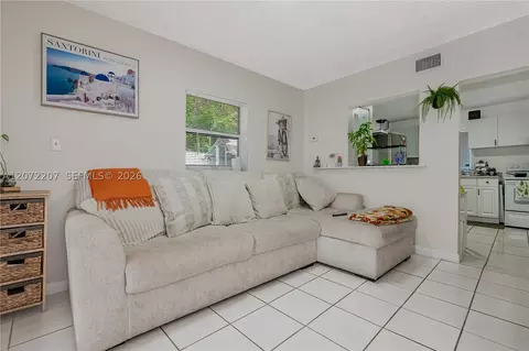 Living - 334 E 11th St, Hialeah, FL 33010 photo 4 of 7