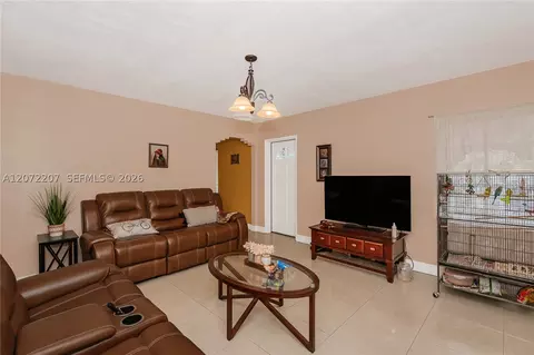 Living - 334 E 11th St, Hialeah, FL 33010 photo 1 of 7
