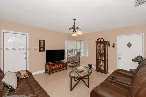 Living - 334 E 11th St, Hialeah, FL 33010 photo 3 of 7