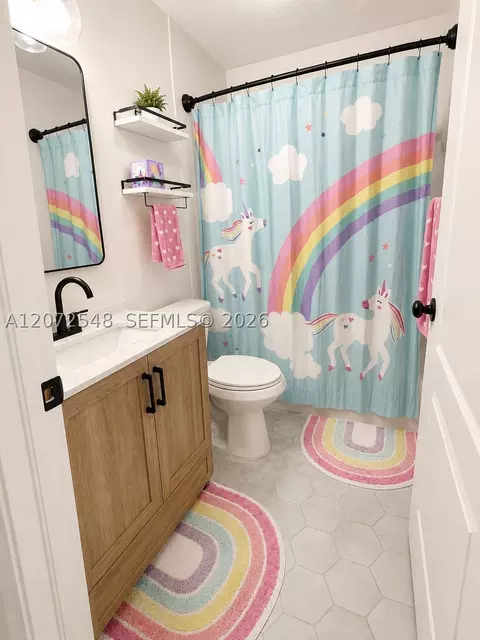 Bath - 9034 SW Caprice Cir, Stuart, FL 34997 photo 3 of 3