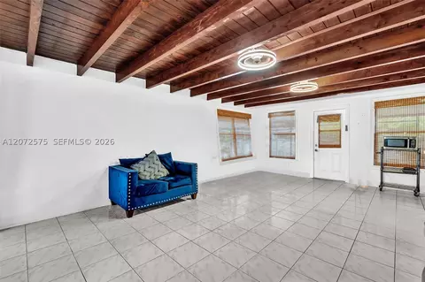 Living - 340 W 55th St, Hialeah, FL 33012 photo 3 of 3