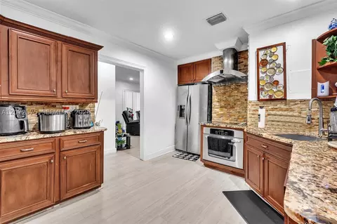 Kitchen - 340 W 55th St, Hialeah, FL 33012 photo 3 of 3