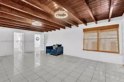 Living - 340 W 55th St, Hialeah, FL 33012 photo 2 of 2