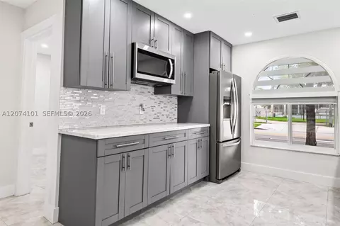 Kitchen - 3197 W 79th Pl, Hialeah, FL 33018 photo 2 of 2