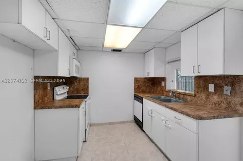 Kitchen - 3711 Riverside Dr, Coral Springs, FL 33065 photo 2 of 2