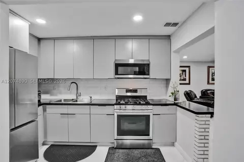Kitchen - 903 W 77th St, Hialeah, FL 33014 photo 2 of 2