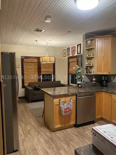 Kitchen - 400 NE 3rd St, Pompano Beach, FL 33060 photo 1 of 3