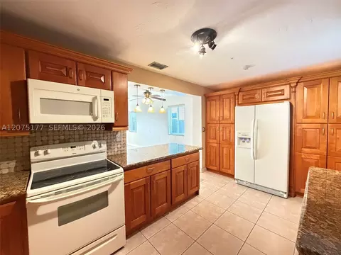 Kitchen - 4585 E 9th Ln, Hialeah, FL 33013 photo 1 of 4