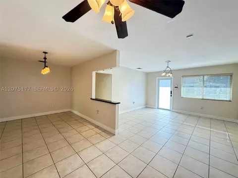 Living - 4585 E 9th Ln, Hialeah, FL 33013 photo 2 of 3