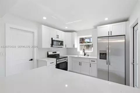 Kitchen - 275 W 13 St, Hialeah, FL 33010 photo 4 of 5