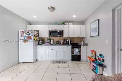 Kitchen - 755 Harem Ave, Opa Locka, FL 33054 photo 3 of 3