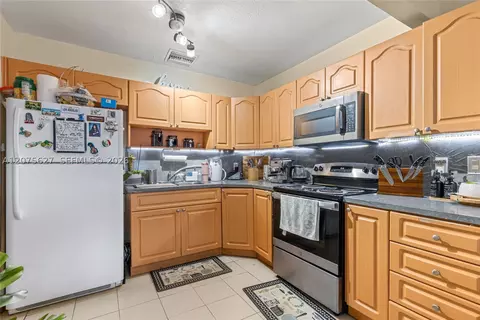 Kitchen - 755 Harem Ave, Opa Locka, FL 33054 photo 2 of 3