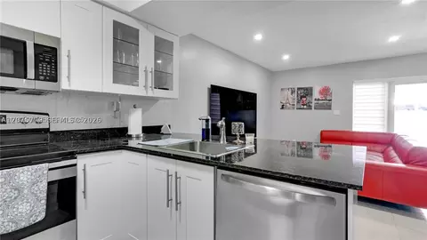 Kitchen - 7025 W 3rd Ct, Hialeah, FL 33014 photo 3 of 3