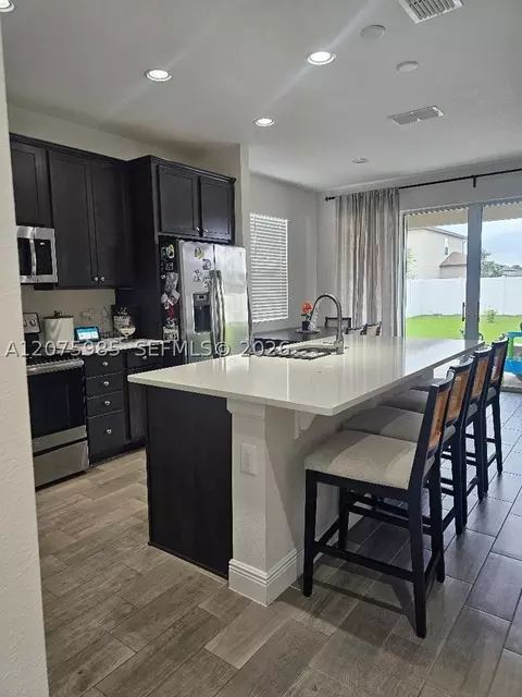 Kitchen - 5605 Blowing Wind Pl, Saint Cloud, FL 34771 photo 2 of 4