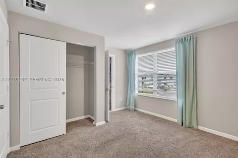 Bedroom - 5610 SEdgewater Cir, Stuart, FL 34997 photo 6 of 7