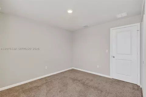 Bedroom - 5610 SEdgewater Cir, Stuart, FL 34997 photo 7 of 7