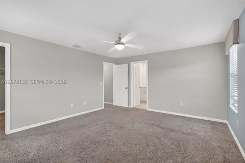 Bedroom - 5610 SEdgewater Cir, Stuart, FL 34997 photo 2 of 7