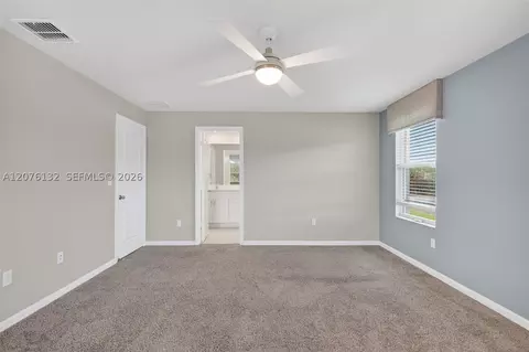 Bedroom - 5610 SEdgewater Cir, Stuart, FL 34997 photo 3 of 7