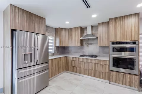 Kitchen - 233 W 39th Pl, Hialeah, FL 33012 photo 1 of 2