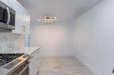 Kitchen - 233 W 39th Pl, Hialeah, FL 33012 photo 2 of 2