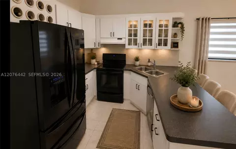 Kitchen - 2121 W 54th St, Hialeah, FL 33016 photo 2 of 2