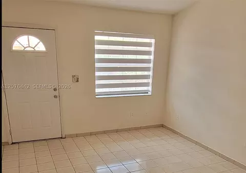 Living - 2121 W 54th St, Hialeah, FL 33016 photo 1 of 5