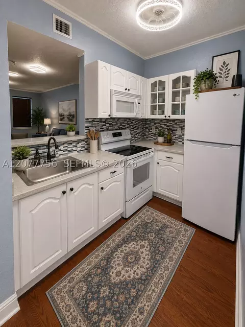 Kitchen - 77 E 4th St #A104, Hialeah, FL 33010 photo 2 of 2
