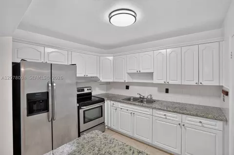 Kitchen - 12840 SW 43rd Dr #176-B, Miami, FL 33175 photo 1 of 2