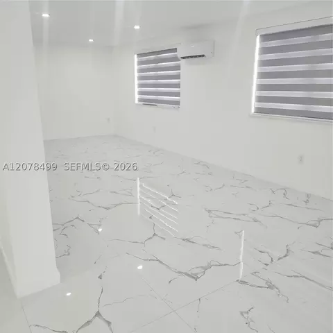 Living - 730 E 17th St, Hialeah, FL 33010 photo 2 of 3