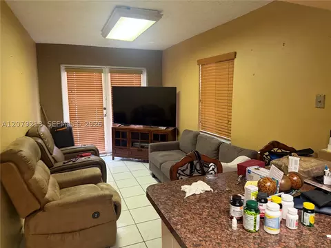Living - 962 E 19th St, Hialeah, FL 33013 photo 2 of 2
