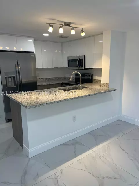 Kitchen - 5764 E 5th Ave, Hialeah, FL 33013 photo 2 of 3
