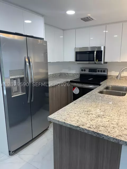 Kitchen - 5764 E 5th Ave, Hialeah, FL 33013 photo 3 of 3
