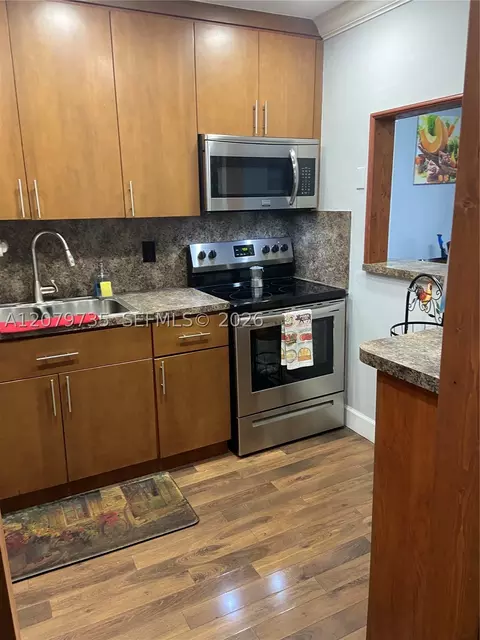 Kitchen - 1075 W 68th St #403, Hialeah, FL 33014 photo 2 of 2