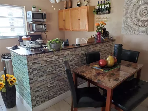 Kitchen - 36 W 37th St, Hialeah, FL 33012 photo 2 of 3