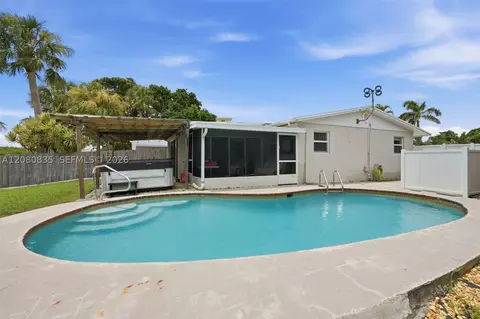 Exterior - 70 SW Hideaway Pl, Stuart, FL 34994 photo 4 of 6