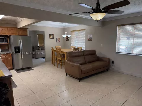 Living - 400 E 57th St, Hialeah, FL 33013 photo 3 of 3