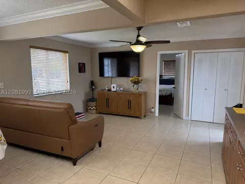 Living - 400 E 57th St, Hialeah, FL 33013 photo 2 of 3