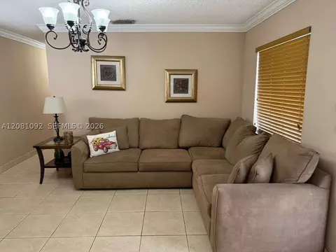 Living - 400 E 57th St, Hialeah, FL 33013 photo 1 of 3