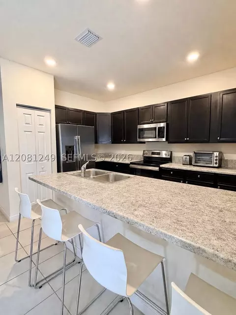Kitchen - 3344 W 105th Ter, Hialeah, FL 33018 photo 3 of 3