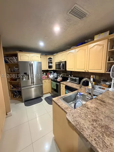Kitchen - 18901 NW 55th Ave, Miami Gardens, FL 33055 photo 1 of 2