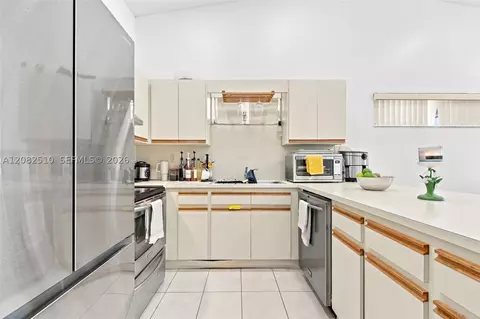 Kitchen - 7330 W 30th Ave, Hialeah, FL 33018 photo 3 of 4