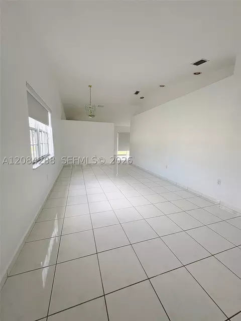 Living - 3397 W 72nd Pl, Hialeah, FL 33018 photo 2 of 2