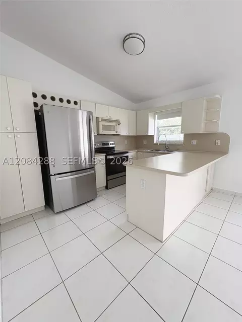 Kitchen - 3397 W 72nd Pl, Hialeah, FL 33018 photo 1 of 3