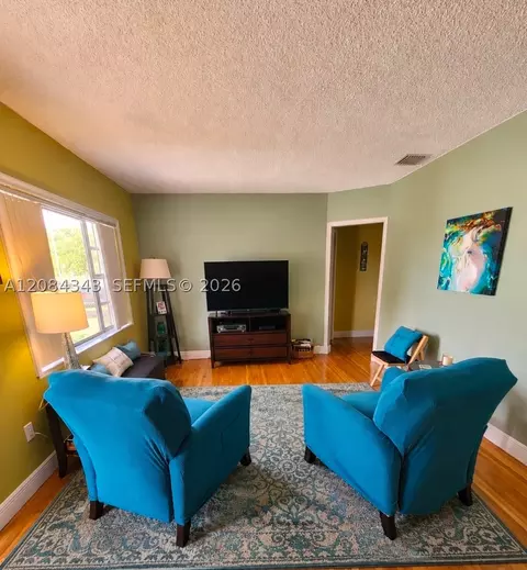 Living - 130 E 35th St, Hialeah, FL 33013 photo 1 of 2