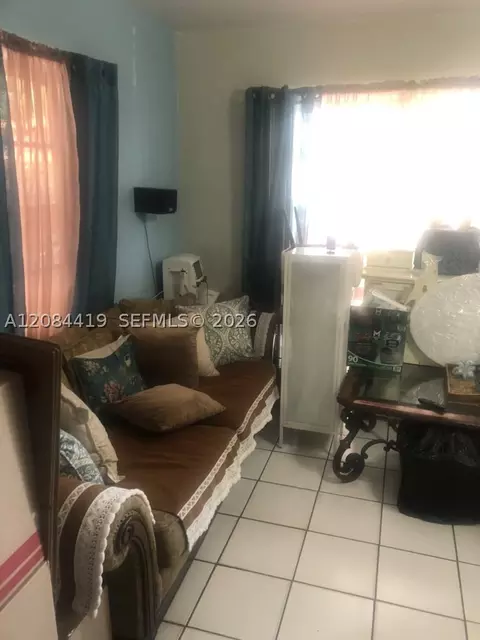 Living - 770 E 17th St, Hialeah, FL 33010 photo 2 of 2