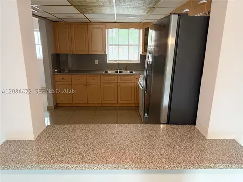 Kitchen - 7006 W 17th Ct, Hialeah, FL 33014 photo 2 of 2