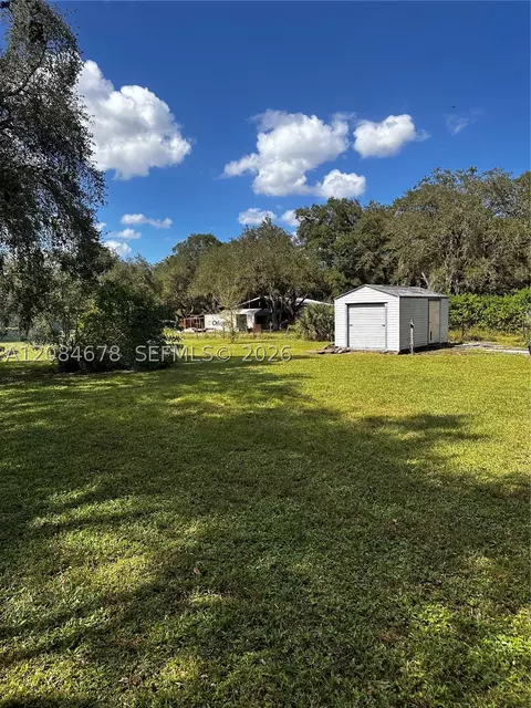 Exterior - 131 Oak Dr, Clewiston, FL 33440 photo 4 of 6