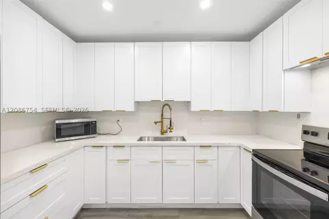 Kitchen - 8253 W 14th Ct, Hialeah, FL 33014 photo 1 of 2