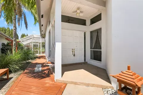Exterior - 173 Orange Tree Dr, Atlantis, FL 33462 photo 4 of 13